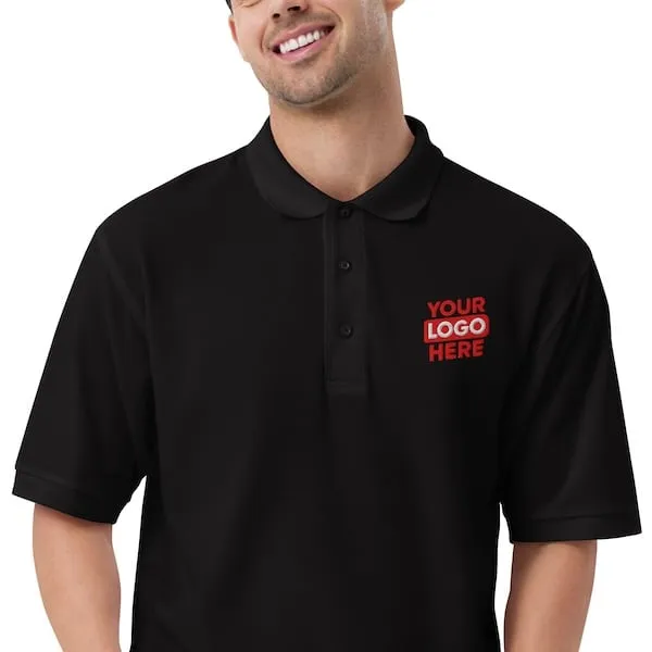 Happy man wearing a corporate polo shirt that has been embroidered with a company logo to represent products available in Atlanta and the surrounding ATL.